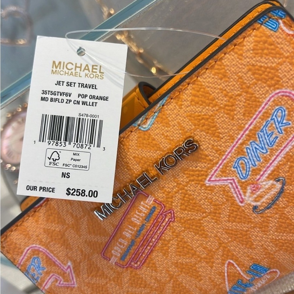 Michael Kors Jet Set Travel Medium Printed Signature Logo Bi-Fold 
Pop Orange - Picture 14 of 14